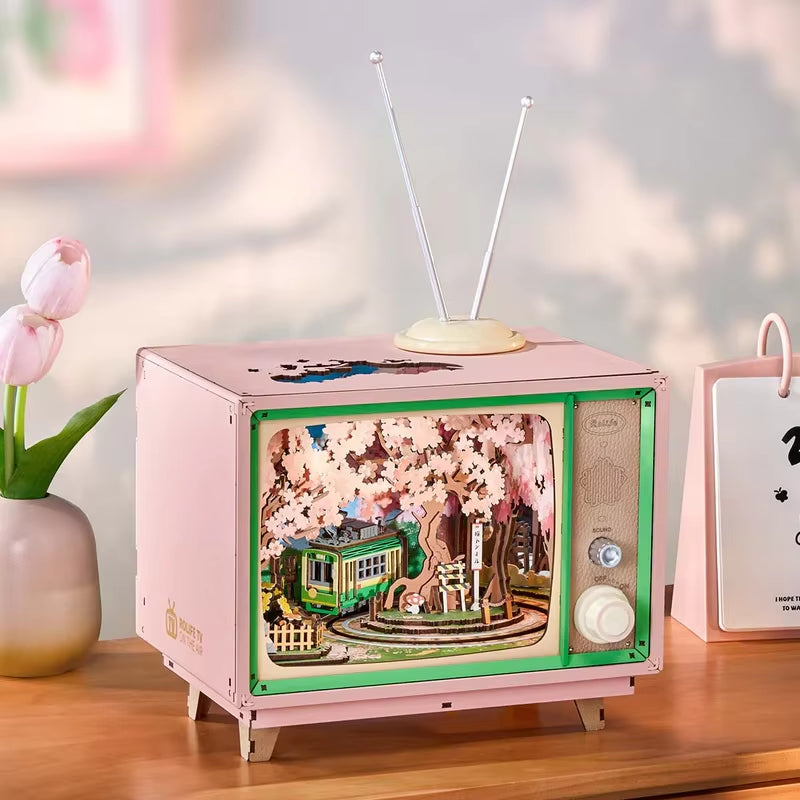 Rolife Bricolage Boîte À Musique Sakura Rêveur Tour 3D Puzzle En Bois Livre Coin TV Modèle Kit Décoration De La Maison Cadeau D'Anniversaire Pour Adulte
