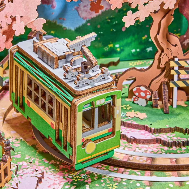 Rolife Bricolage Boîte À Musique Sakura Rêveur Tour 3D Puzzle En Bois Livre Coin TV Modèle Kit Décoration De La Maison Cadeau D'Anniversaire Pour Adulte